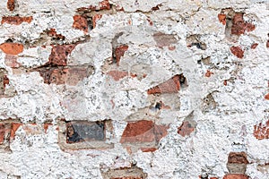 Old chipped white brick wall texture background, whitewashed