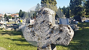 Old christian cross at cemetery - Slatina Croatia - Virovitica-Podravina County