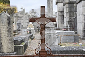 Old Christian crosses and tombs in a cemetery in France