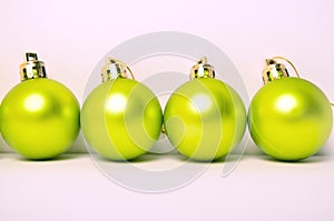 4 old christmas balls on white background