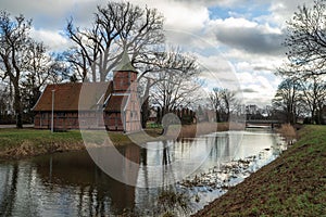 An old church on the banks of the Motlawa River in Wroblewo