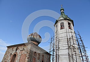 The old church building with a bell tower in Volkhov.