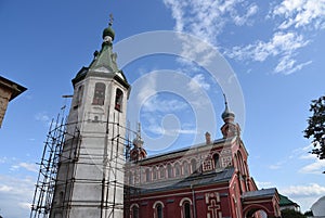 The old church building with a bell tower in Volkhov.