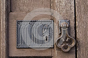 Old church door with handle and lock