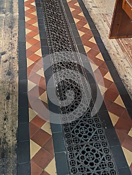 An Old Church Floor with Decoration and Heat Guttering
