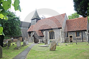 an old church with its grave yard and headstones