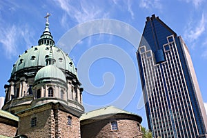 Old Church and Modern Building