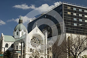 Old church and modern building