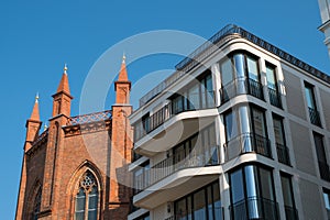 Old church and modern building facade, Berlin Mitte