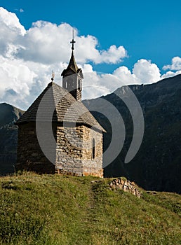 Old church and mountains in National Park Hohe Tauern
