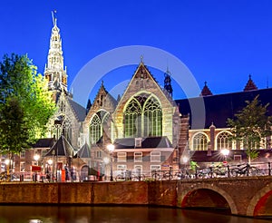 Old Church (Oude Kerk) and Amsterdam canals at night, Netherlands