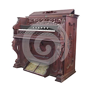 Old church pump organ isolated.