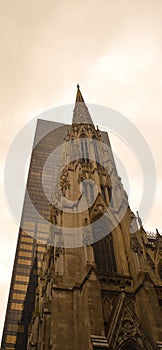 Old church and skyscraper