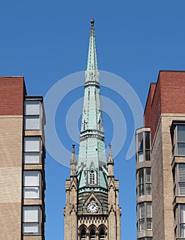 Old church steeple and buildings photo