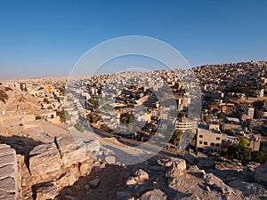 Old city of Amman, downtown with many apartment buildings and Roman theater. Capital of Jordan.