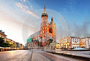 Old city center view with Adam Mickiewicz monument and St. Mary' photo