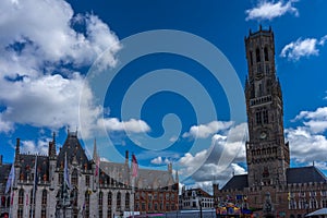 The old city hall along with the Belfry tower in the Markt square in Bruges, Belgium, Europe