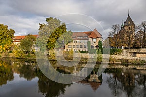 The old city Hamelin on a river, Germany