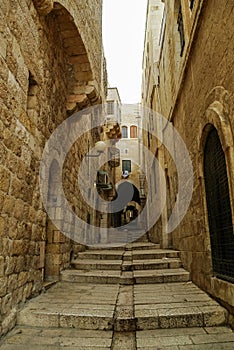 Old city hidden passageway, stone stairway and arch. Jewish Quarter, Jerusalem