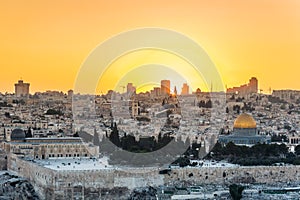 Old city of Jerusalem on the temple mount under golden sunset in the evening with golden dome of the rock, Al-aqsa mosque, sunset