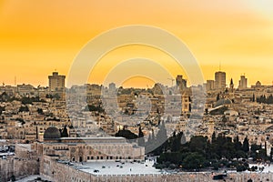 Old city of Jerusalem on the temple mount under golden sunset in the evening with golden dome of the rock, Al-aqsa mosque, view