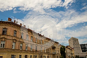 Old city street building alley way with modern office apartment background urban landmark view panoramic foreshortening with blue