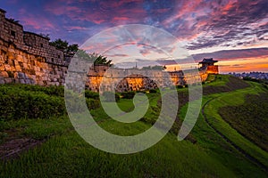 Old city wall at Hwaseong Fortress after Sunset, Traditional Architecture of Korea at Suwon, South Korea