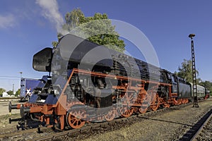 An old class 01 steam locomotive is ready for departure