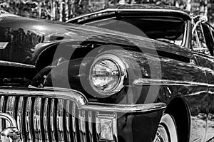 Old classic car from the forties in black and white