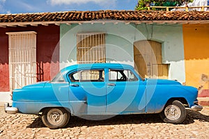 Old classic fifties car in a street of Trinidad