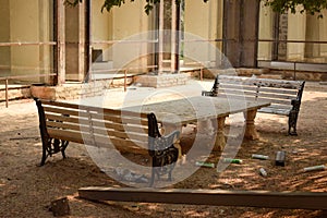 Old Classic Iron Park bench, iron bench and Cente Table Stock Photo