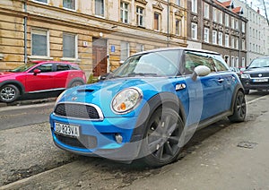 Classic compact car blue Mini Cooper parked