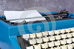 An old classic typewriter on wooden desk. Copy space. For text purpose.