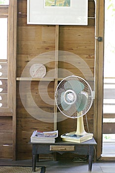 Old classic wooden house with fan
