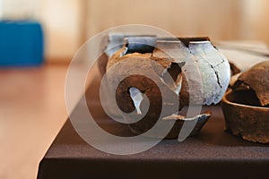 Old clay jug with cracks