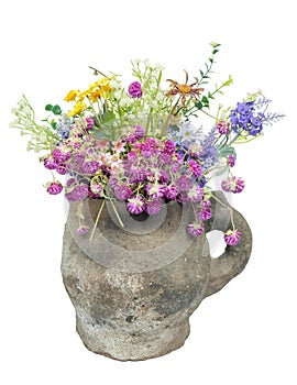 Old clay jug with dried flowers