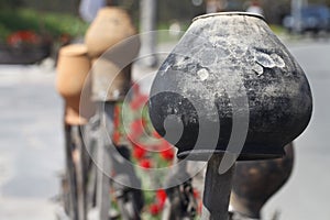 Old clay jug and tulips