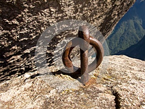 Old climbing bolt used in dedo de deus conquer at 1912 in Brazil photo