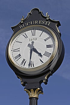 Anniversary outdoor clock on a blue sky background