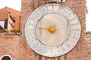 Old clock of the Church in Venice