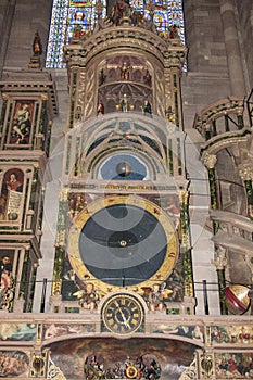 Old clock inside the cathedral of Strasbourg in Alsace France.