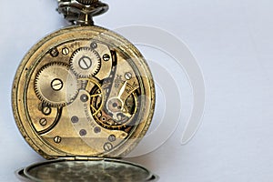 Old clock with machinery in sight