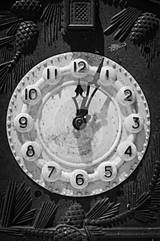 Old clock mechanism, black and white. Retro clock arrows and numbers. Time measure. New year concept. The past epoch.