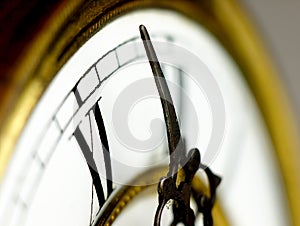 Old clock with roman numerals.