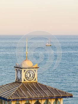 Old clock on a tower of Eastbourne's Pier