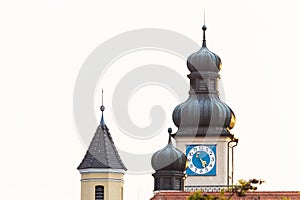 Old clock tower with onion domes