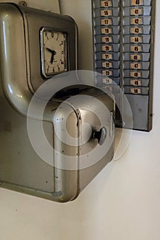 Old clock work badge check machine