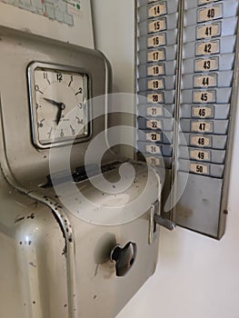 Old clock work badge check machine
