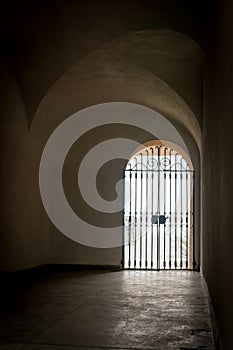 Old closed gate in the old residential building in Warsaw