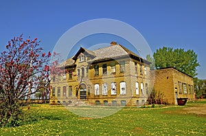 Old closed two story schoolhouse